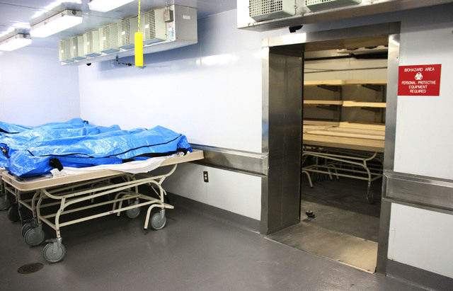 Bodies lay covered in a storage fridge at the Clark County Coroner's Office on Monday, Dec. 30, 2013. The office gets an average of 10 to 12 cases a day (Rachel Crosby/Special to the Review-Journal)