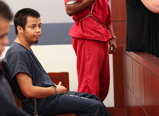 Murder suspect Jonathan Perez, 22, sits during a preliminary hearing in front of Judge Ann Zimmerman at the Regional Justice Center in Las Vegas on Friday, May 9, 2014. Perez is accused of shootin ...