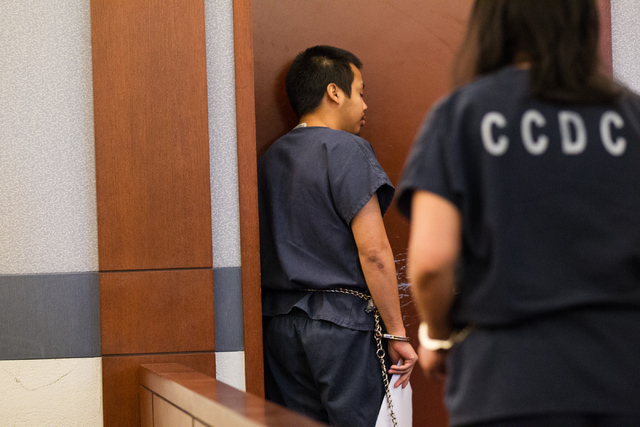 Murder suspect Jonathan Perez, 22, waits after a preliminary hearing in front of Judge Ann Zimmerman at the Regional Justice Center in Las Vegas on Friday, May 9, 2014. Perez is accused of shootin ...