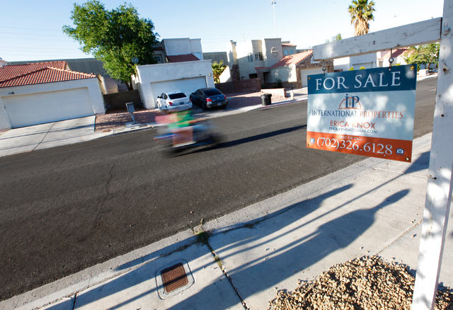 A for sale sign is seen at a home on Harmony Avenue near Michael Way in the 89107 zip code of Las Vegas on Wednesday, April 30, 2014. Home values in 89107 increased 53.2% in 2013. (Chase Stevens/L ...