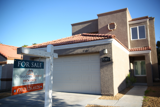 A for sale sign is seen at a home on Harmony Avenue near Michael Way in the 89107 zip code of Las Vegas on Wednesday, April 30, 2014. Home values in 89107 increased 53.2% in 2013. (Chase Stevens/L ...