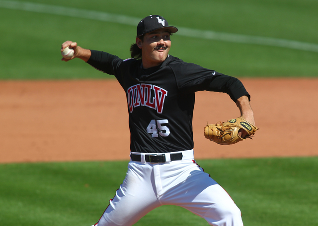 UNLV's John Richy (45) pitches the ball against San Jose State during a game at Earl E. Wilson Stadium in Las Vegas on Saturday, April 12, 2014. UNLV won 2-1. (Chase Stevens/Las Vegas Review-Journal)