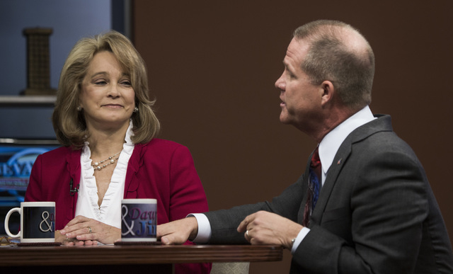 Former state Sen. Sue Lowden, left, and state Sen. Mark Hutchison, R-Las Vegas, talk about issues during the Republican lieutenant governor debate at KSNV, Channel 3 studios on Monday, May 12, 201 ...
