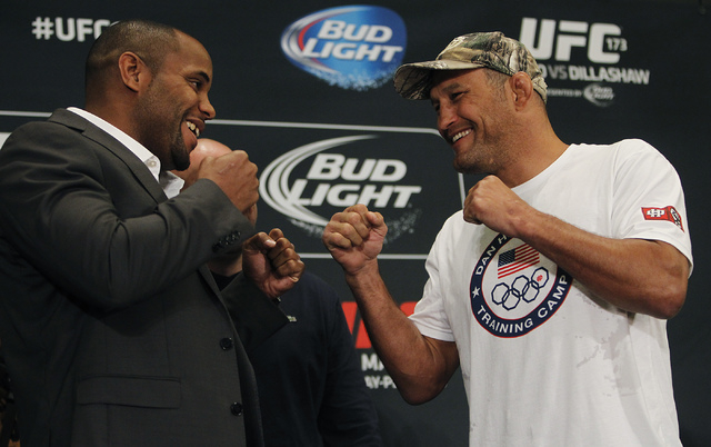 Fighters Daniel Cormier, left, and Dan Henderson "face off" during media day for UFC 173 at the MGM Grand in Las Vegas on Thursday, May 22, 2014. (Jason Bean/Las Vegas Review-Journal)