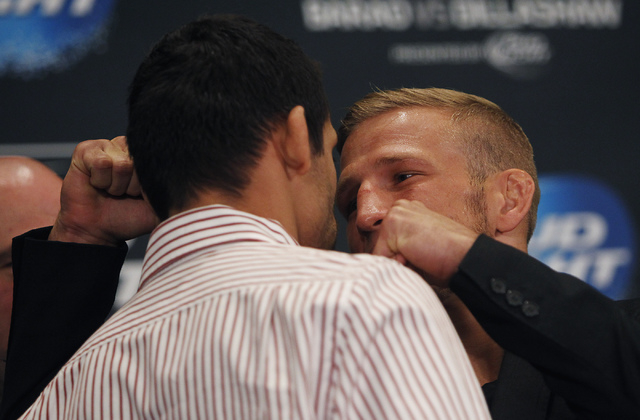 Fighters Renan Barao, left, and TJ Dillashaw "face off" during media day for UFC 173 at the MGM Grand in Las Vegas on Thursday, May 22, 2014. (Jason Bean/Las Vegas Review-Journal)