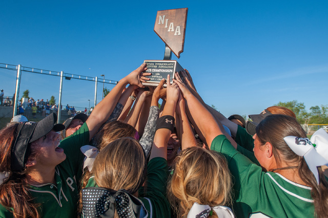 Palo Verde players hold up the state championship trophy after defeating Reed 12-8 Saturday for the Division I state title. (Kevin Clifford/Special to the Review-Journal)