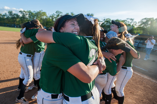 alo Verde's Kelsea Sweeney, right, and Rachel Williams hug after their team defeated Reed 12-8 to capture the Division I state softball title on Saturday. (Kevin Clifford/Special to the Review-Jou ...