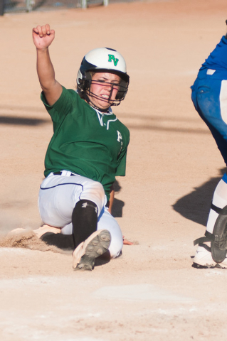 Palo Verde's Jordan Menke slides home and scores against Reed in the deciding game of the Division I state softball tournament on Saturday. Palo Verde won the game 12-8 to win the state title. (Ke ...