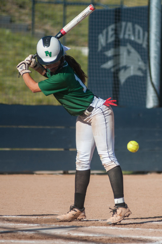 Palo Verde's Haley Harrison dodges a close pitch while playing against Reed in the deciding game of the Division I state softball tournament on Saturday. Palo Verde won the game 12-8 to win the st ...