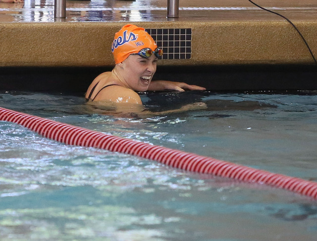 Bishop Gorman's Amy Lubawy smiles after she competes in the 100-yard freestyle during the Division I state swim meet on Saturday. Lubawy broke the state record with a time of 49.82 seconds. (Ronda ...