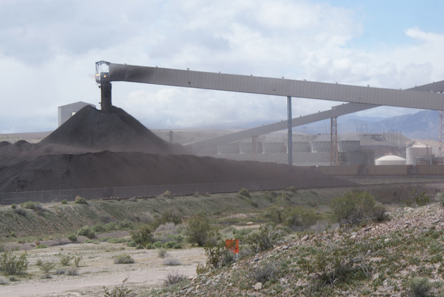 Ash blows from the coal waste pile of the NV Energy Reid Gardner power station, shown in this courtesy photo dated Jan. 5, 2010. NV Energy south is proposing to close three of its four Reid Gardne ...