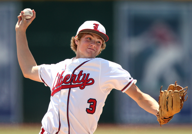 Liberty's Trevor Mullaney pitches against Centennial in the Division I state championship game on Saturday. Mullaney allowed two runs on six hits in six innings to get the victory as Liberty defea ...