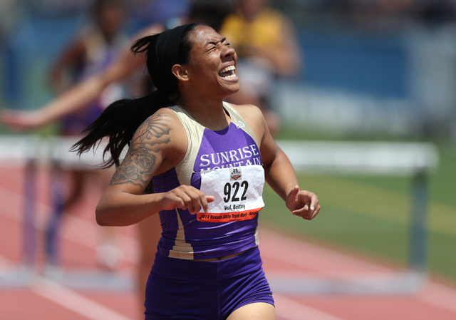 Sunrise Mountain's Brittany Veal reacts to winning the Division I-A girls 300-meter hurdles title with a time of 44.55 seconds on Saturday. (Cathleen Allison/Special to the Review-Journal)