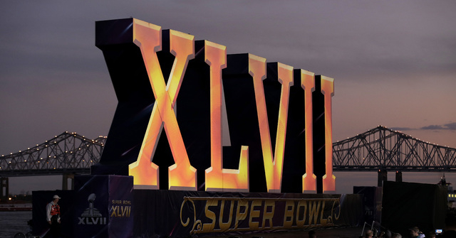 In this Feb. 2, 2013 file photo, the Roman numerals for NFL Super Bowl XLVII float on the Mississippi River in New Orleans. The 50th edition of the game will be played in February 2016 in Santa Cl ...