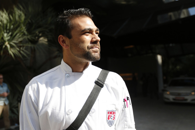 In this photo taken June 9, 2014, United States men's soccer team chef Bryson Billapando waits for the team to arrive at the team hotel in Sao Paulo, Brazil. Long before the U.S. team traveled to  ...