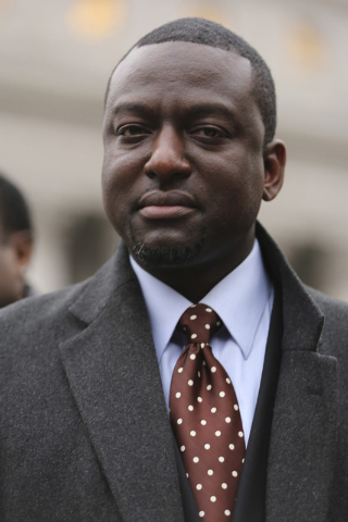 In this Jan. 17, 2013 file photo, Yusef Salaam is photographed during a rally outside Federal court in New York.  A city official said Friday, June 20, 2014 that New York City has agreed to a $40  ...