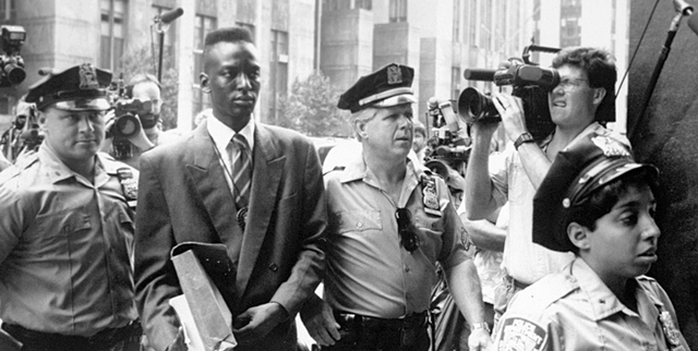 This 1990 file photo provided by Sundance Selects shows accused rapist Yusef Salaam, second right, being escorted by police in New York in 1990. Salaam is the subject of the documentary, "The Cent ...