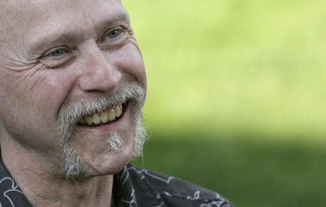 This Monday, June 16, 2014 photo shows Bill Palmisano smiling in North Canton, Ohio. A northern Georgia doctor running off-the-books adoptions in the 1950s and 60s placed infants with out-of-state ...