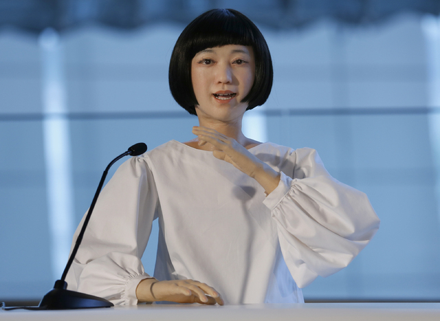 Android robot Kodomoroid speaks during a press event at the National Museum of Emerging Science and Innovation Miraikan in Tokyo Tuesday, June 24, 2014. The latest creations from Japanese android  ...
