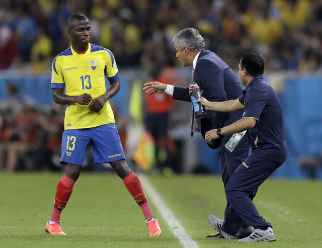 Ecuador's head coach Reinaldo Rueda gives directions to Ecuador's Enner Valencia during the group E World Cup soccer match between Ecuador and France at the Maracana Stadium in Rio de Janeiro, Bra … | Ecuador's head coach Reinaldo Rueda gives directions to Ecuador's Enner Valencia during the group E World Cup soccer match between Ecuador and France at the Maracana Stadium in Rio de Janeiro, Bra … |