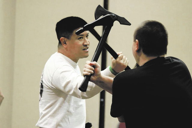 Participants face each other at Combat Con 2014, a gathering at the Riviera celebrating the historical European martial arts. (Photos courtesy Gina Nichole with Gina V Photography)