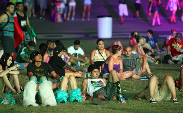 Attendees relax by the Cosmic Meadow stage at the Electric Daisy Carnival at the Las Vegas Motor Speedway in Las Vegas on Saturday, June 21, 2014. (Chase Stevens/Las Vegas Review-Journal)