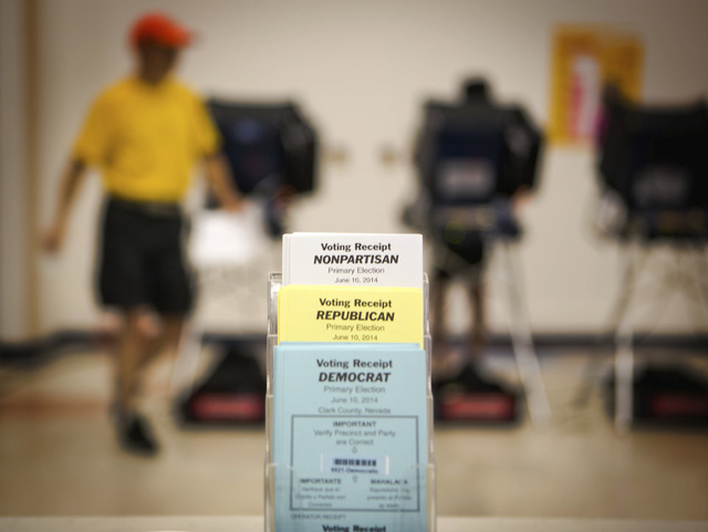 Voting as seen Tuesday, June 10, 2014 at D'Vorre & Hal Ober Elementary School at 3035 Desert Marigold Lane. Election officials are expecting a low turn out in today's primary election. (Jeff Schei ...