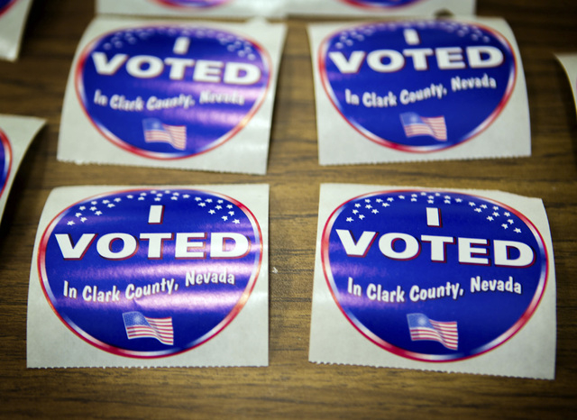 Voting stickers as seen Tuesday, June 10, 2014 at D'Vorre & Hal Ober Elementary School at 3035 Desert Marigold Lane. Election officials are expecting a low turn out in today's primary election.(Je ...