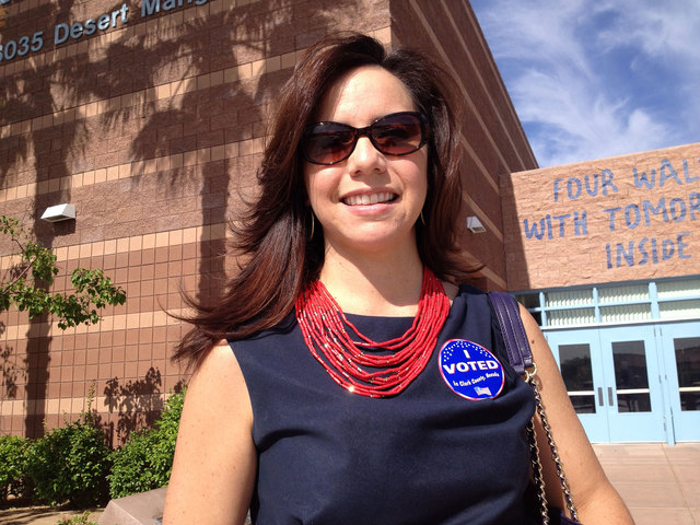Angelique Williams wears her "I Voted" sticker after submitting her ballot Tuesday morning, June 10, 2014, at the Ober Elementary School polling place in The Willows community in Las Vegas. (Keith ...
