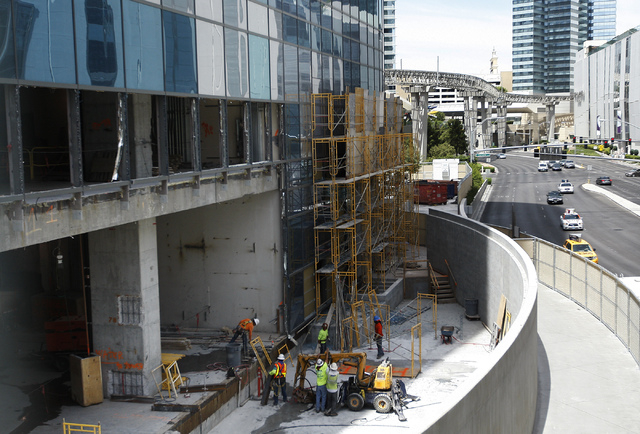 Workers are seen during the demolition of the Harmon Hotel at City Center in Las Vegas on Friday, June 20, 2014. (Jason Bean/Las Vegas Review-Journal)