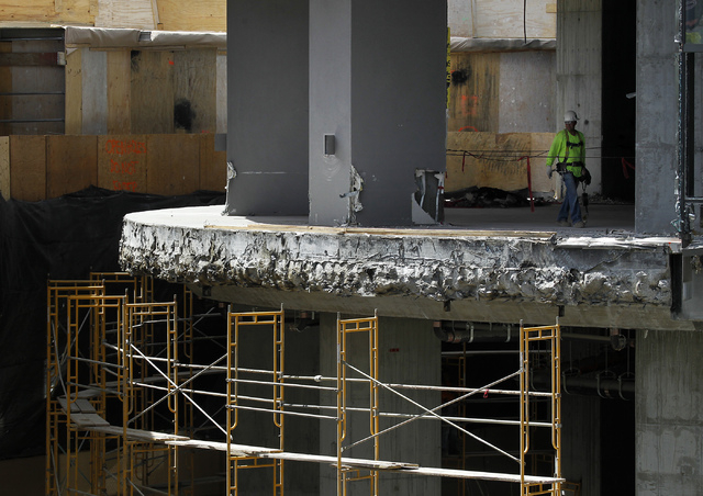 A worker is seen during the demolition of the Harmon Hotel at City Center in Las Vegas on Friday, June 20, 2014. (Jason Bean/Las Vegas Review-Journal)