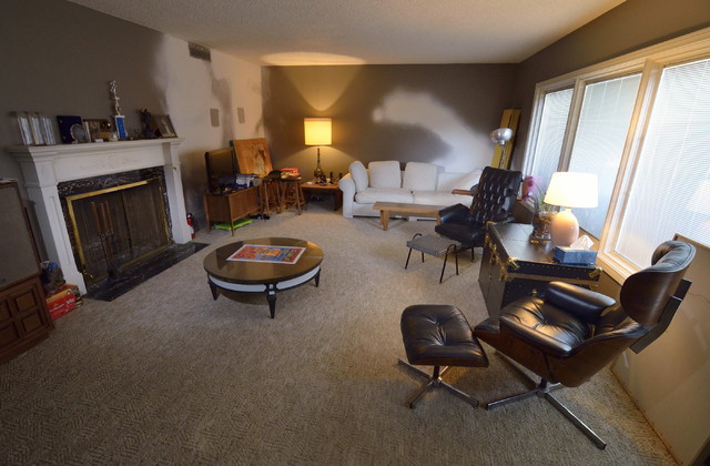 A living room which is undergoing some renovations is shown at the home of Dayvid Figler near the intersection of 6th Street and Charleston Boulevard in Las Vegas on Friday, June 13, 2014. (Bill H ...