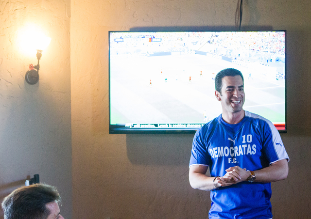 State Sen. Ruben Kihuen, D-Las Vegas, speaks during his "Soccer with the Senator" event for supporters featuring a watch party for the Mexico vs. Brazil World Cup game at Tacos & Beer, 3 ...