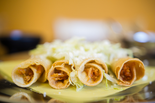 Chicken taquitos are seen at Las Cazuelas, 9711 S. Eastern Ave., in Las Vegas on Saturday, June 7, 2014. (Chase Stevens/Las Vegas Review-Journal)