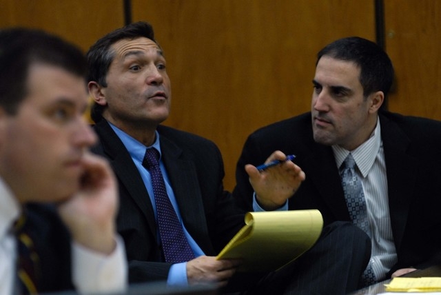 FILE***
Darren Mack, right, listens as his attorney William Routsis questions Mack's brother, Landon, during a hearing on Jan. 15, 2008, where Darren Mack was attempting to withdraw his guilty ple ...