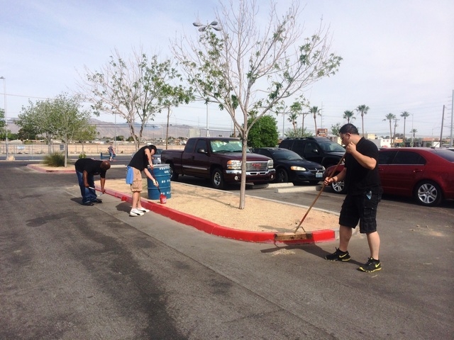 Volunteers from the Nevada Beverage Company and community members participate during a Las Vegas park beautification project coordinated by Keep Las Vegas Beautiful at Ed Fountain Park, 1400 N. De ...