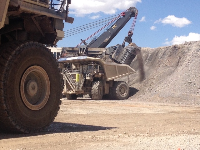 A $30 million shovel at the Cortez Mine loads a bucket of dirt into a two-story tall dump truck in one of two open pit operations at the site 70 miles southwest of Elko. (Sean Whaley/Las Vegas Rev ...
