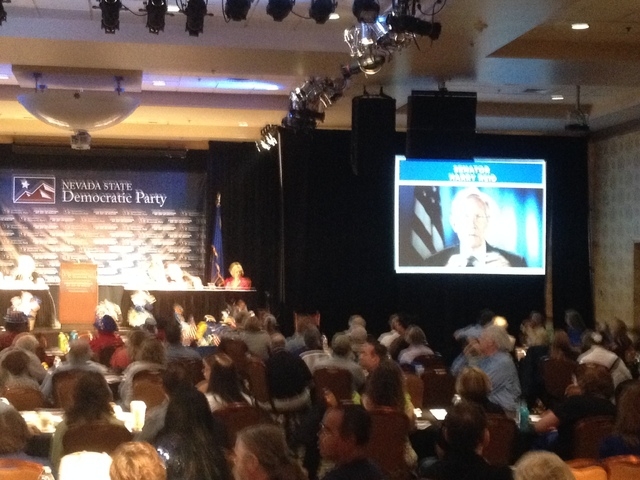 Harry Reid addresses the delegates via video at the Reno Democratic convention. (Whip Villarreal, Las Vegas Review-Journal)