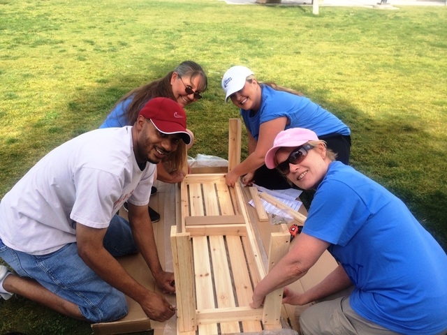 Volunteers from the Nevada Beverage Company and community members participate during a Las Vegas park beautification project coordinated by Keep Las Vegas Beautiful at Ed Fountain Park, 1400 N. De ...