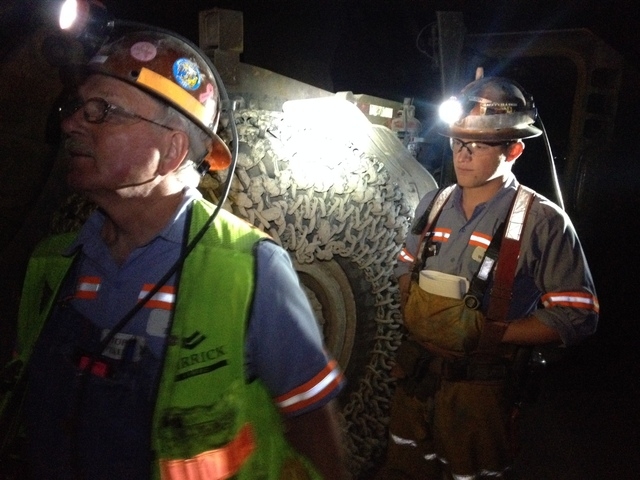 John Taule, general supervisor of the underground mine operation, left, and Matt Wilson, underground engineer, look over the previous day's blasting at the Cortez Hills mine 70 miles southwest of  ...