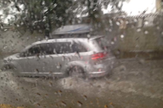 The flooded streets on the way to Recife's Arena Pernambuco for the USA vs Germany game. (Brennan Karle)