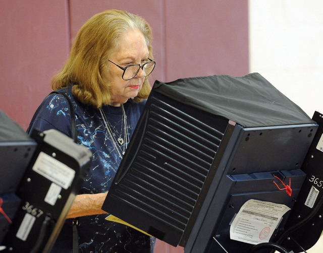 Verlene Wheeler votes at the polling place at Cimarron-Memorial High School in Las Vegas, Tuesday, June 10, 2014. (Jerry Henkel/Las Vegas Review-Journal)