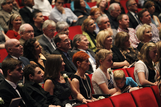Wife Beverly Rogers, middle with red hair, sits among friends and family during the memorial service for her husband, the late Jim Rogers, at Ham Concert Hall at UNLV in Las Vegas on Saturday, Jun ...