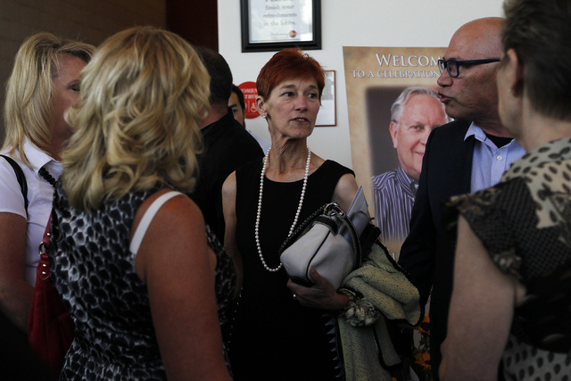 Beverly Rogers, middle, wife of Jim Rogers, speaks with friends and family following the memorial service for her husband, the late Jim Rogers, at Ham Concert Hall at UNLV in Las Vegas on Saturday ...
