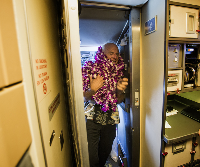 Southwest Airline pilot Capt. Fred Sorenson leaves the cockpit at McCarran International Airport after making his final flight with the airlines on Wednesday, June 11 , 2014. Sorenson, known ...