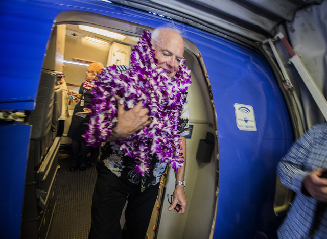 Southwest Airline pilot Capt. Fred Sorenson leaves the cockpit at McCarran International Airport after making his final flight with the airlines on Wednesday, June 11 , 2014. Sorenson, known ...