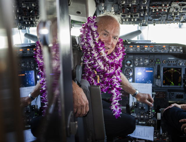 Southwest Airline  pilot Capt. Fred Sorenson sits in  the cockpit at  McCarran International Airport after making his final flight with the airlines  on Wednesday, June 11 , 2014.  Sorenson, known ...