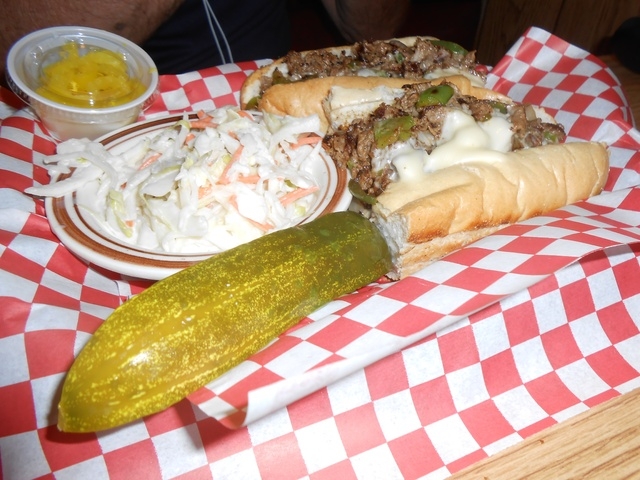 Triple Play American Grill's claim to fame, the cheesesteak sandwich, is shown in the 10-inch version. Its menu offers up nine variations, including a pizza version and vegetarian one that has the ...
