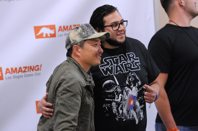 Jose Corona is photographed with comic book illustrator and publisher Jim Lee during the 2014 Amazing Las Vegas Comic Con at South Point casino-hotel in Las Vegas Saturday, June 21, 2014. (Erik Ve ...