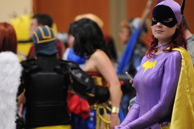 Shauna Webb, in character as 1960's Batgirl, waits in line to participate in the costume contest during the 2014 Amazing Las Vegas Comic Con at South Point casino-hotel in Las Vegas Saturday, June ...